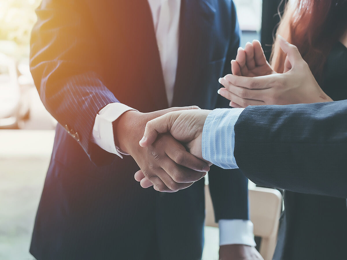 Business shaking hands. Business executives to congratulate the joint.