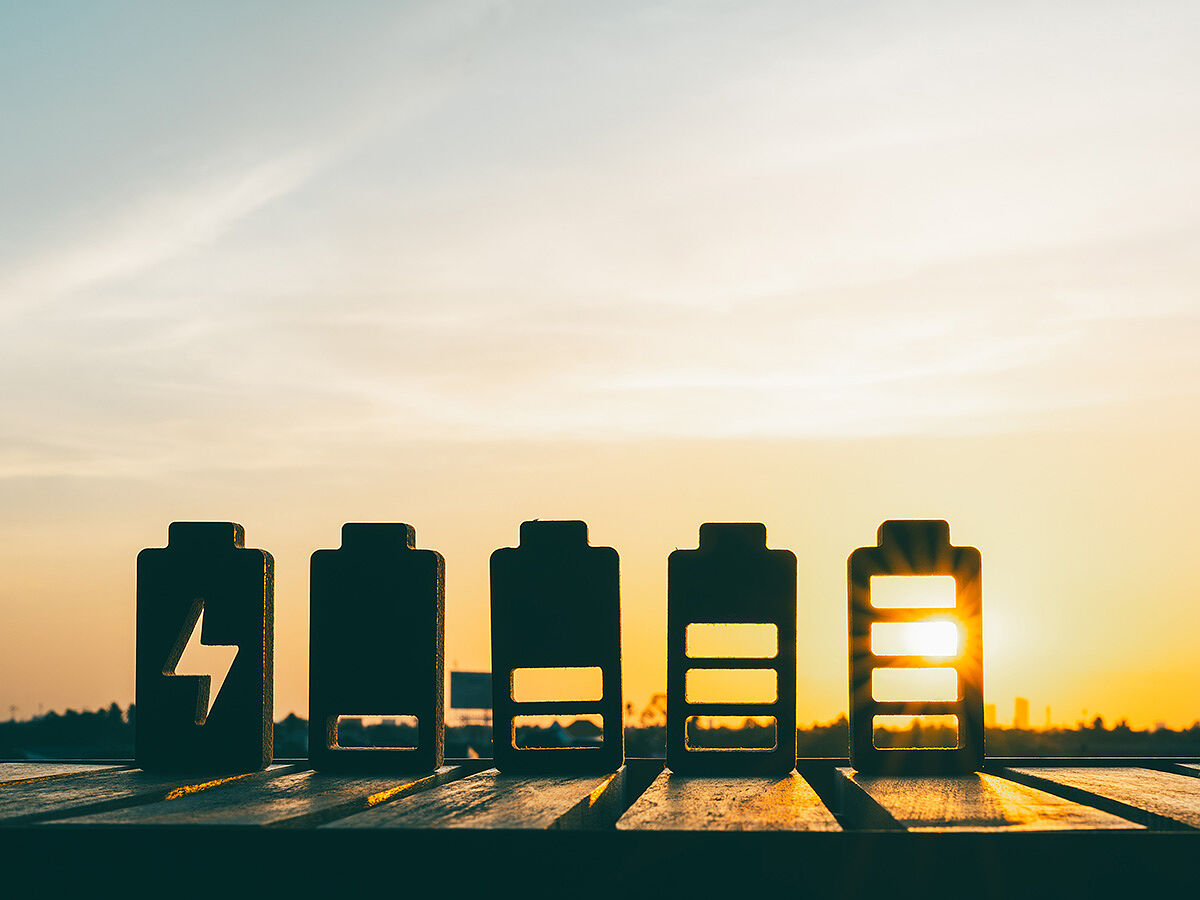 Battery charge indicator wood model. Phone charge level. Discharged and fully charged battery. Battery charge from high to low.