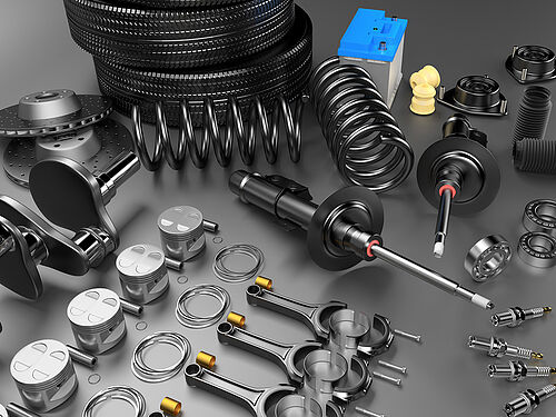 Auto parts spare parts car on the grey background. Set with many new items for shop or aftermarket. Auto parts for car. 3D rendering